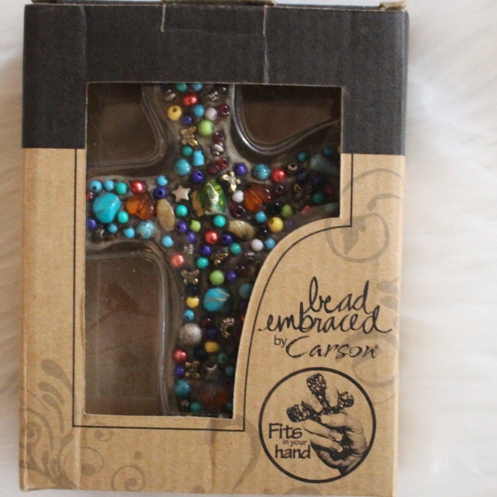 Caron, bead embraced cross